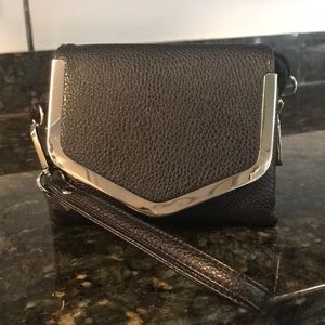 Black purse w/ long detachable strap as well